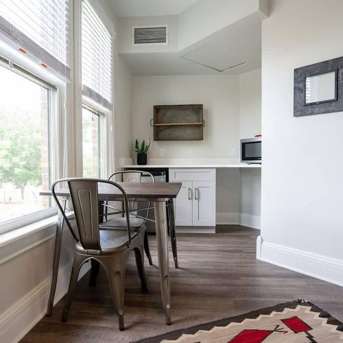 The room has its own dining seat, microwave and mini fridge.