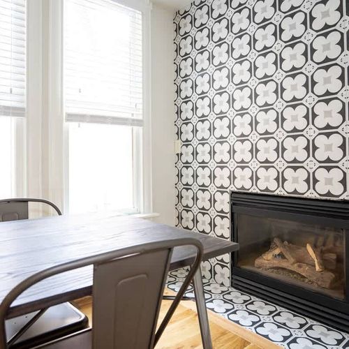 Guests can use the bistro set to enjoy a breakfast by the fireplace.