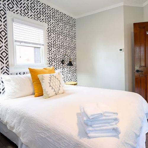 Next to the bed, guests will find the private bathroom.