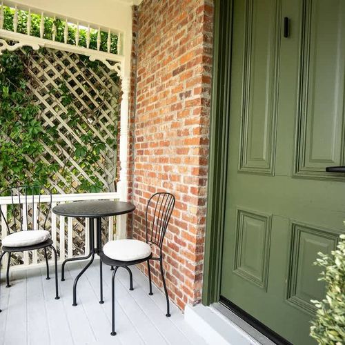 The room has its own private patio with a bistro set