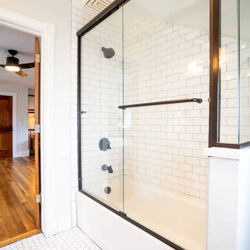 The room has a full bathroom