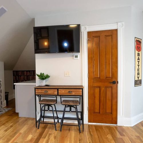 The room includes a breakfast bar, full bathroom + closet.
(The fireplace is currently out of order and not available for use.)