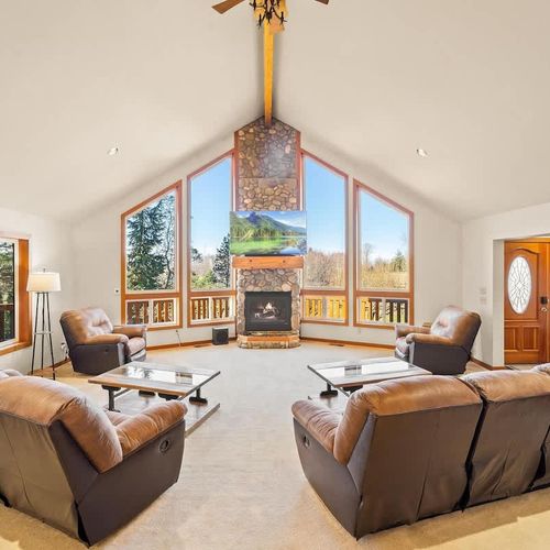 From the main living room, enjoy the fireplace, stream your favorite show or watch the sunset from the west-facing windows.