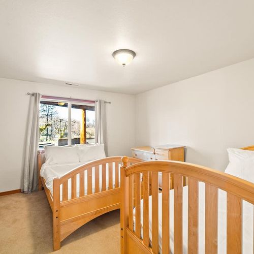 Bedroom downstairs with 2 double beds