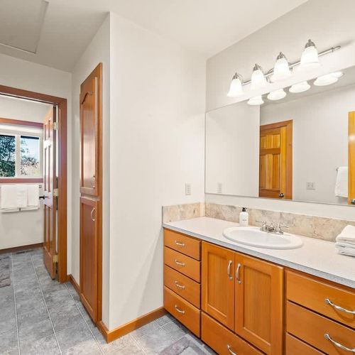 3 of 4 bathrooms at the property.