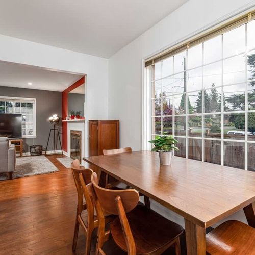 Dining table off the living room and kitchen