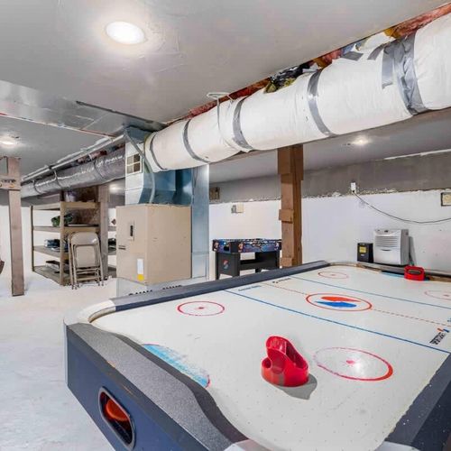 The game room downstairs with foosball, table tennis and air hockey!