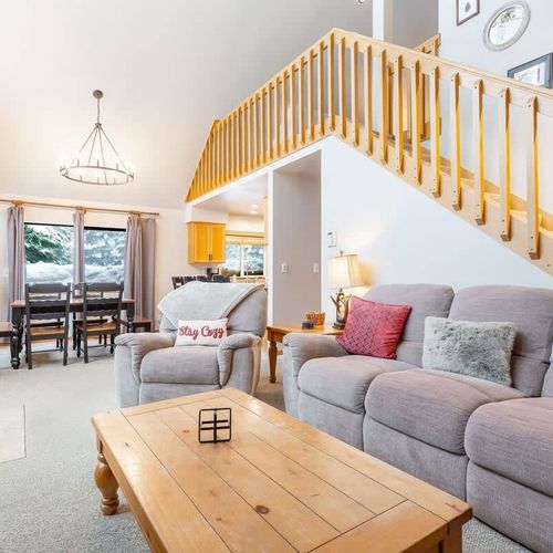 The second, loft living room with futon is upstairs.