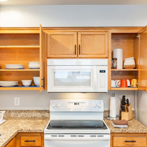 The cabin is equipped with a full kitchen.