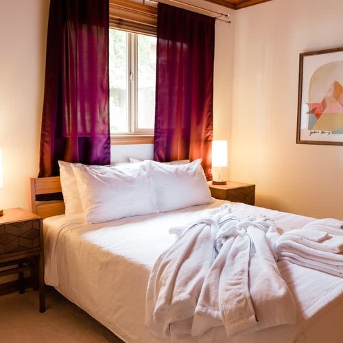 Second bedroom with Queen bed, luxury bed linens and comfy robes.