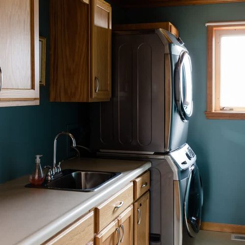 Full size washer and dryer in the house.
