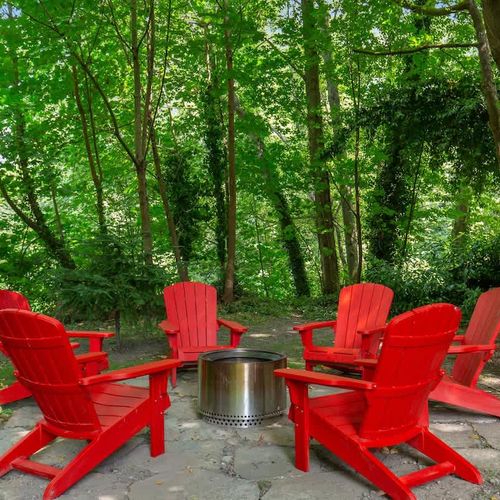 Where city lights fade and nature takes over: experience tranquility by our backyard fire pit.