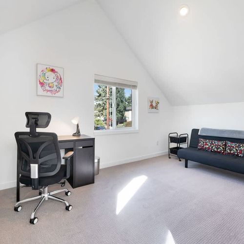 The second bedroom includes a desk, desk chair and futon suitable for 1 person.