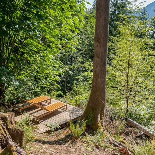 There is so much to explore at the house, including this secluded lounging area, located just off the fire pit area.