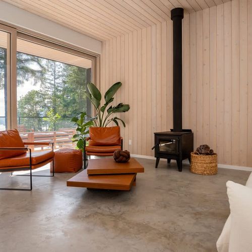 Relax with incredible views in the open living space with easy access to back deck