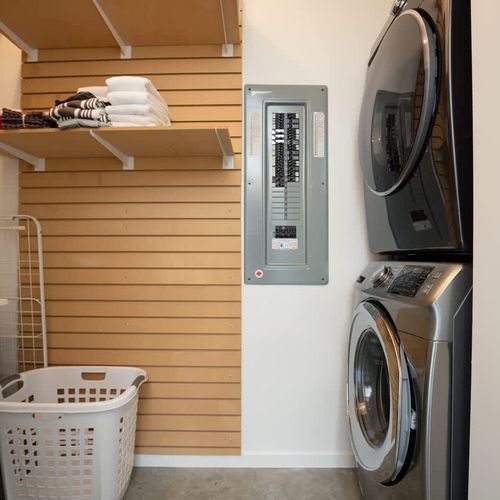 Full laundry facilities can be found near the bedrooms.