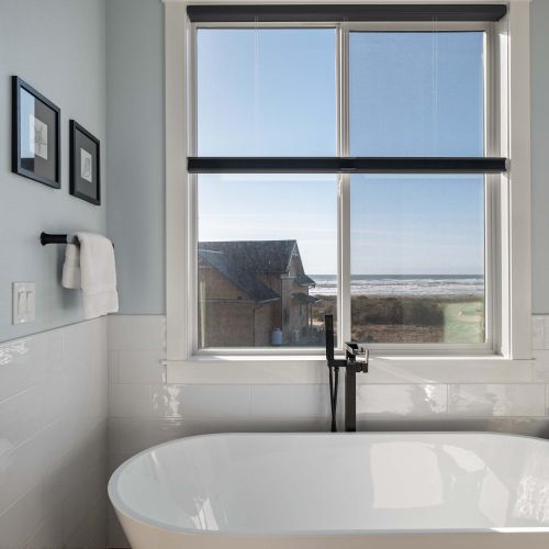 Unwind in the deep tub while taking in peaceful natural light and sky views