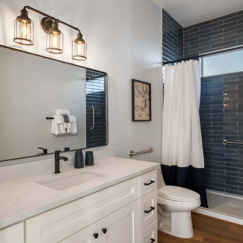 Bathroom 2 of 3 - bright, clean, and ready with essentials.