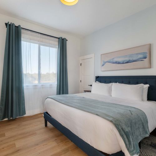Comfortable and quiet—king bed with nightstands and blackout curtains.