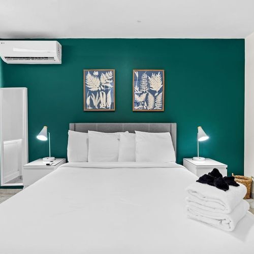 A serene retreat with a pop of sophisticated color.