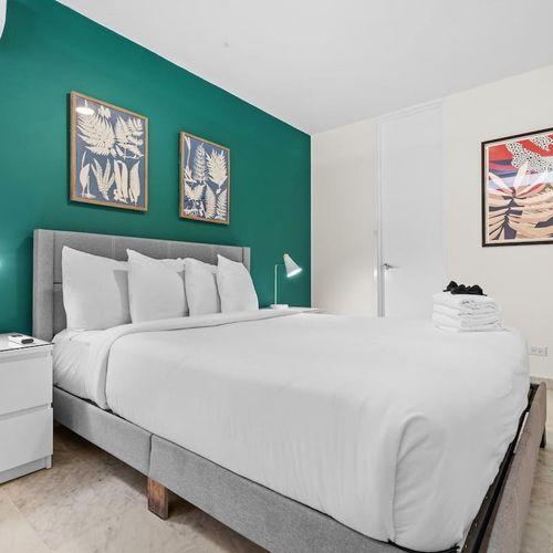 Stylish bedroom with chic decor and a comfortable bed