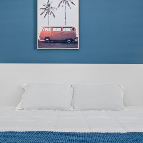 Discover your home away from home; our inviting bedroom is equipped with all you need for a restful night’s sleep amidst stylish surroundings.