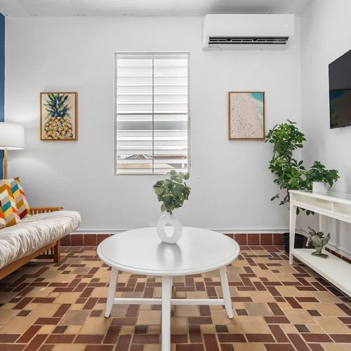 Escape to a world of comfort and relaxation in our beautifully appointed living area, perfect for reading or enjoying quiet moments.