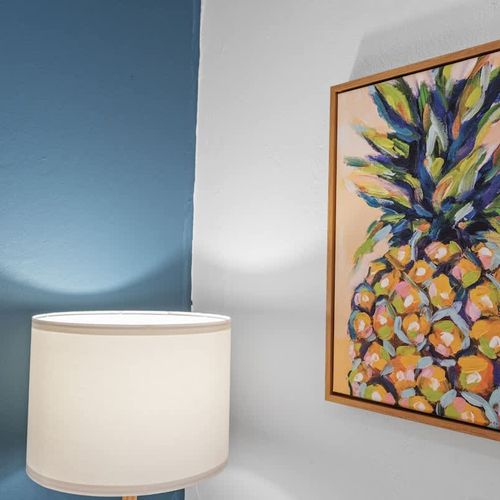 Experience comfort and tranquility in our stylish bedroom adorned with modern art and equipped with everything you need for a restful stay.