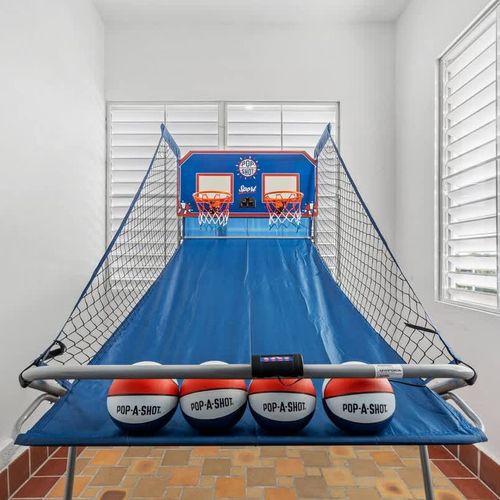 Step into our expansive game room, complete with a Pop-A-Shot machine – let the games begin.