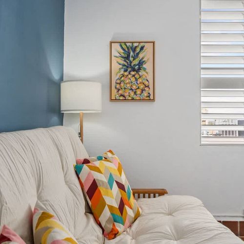 Enjoy your downtime in our stylish living area, complete with comfortable seating and tasteful decor that feels like home.