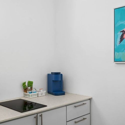 Everything you need to prepare simple meals is at your fingertips in this clean, contemporary space.