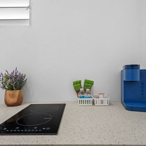 Enjoy the simplicity and efficiency of our compact yet well-equipped kitchen space.