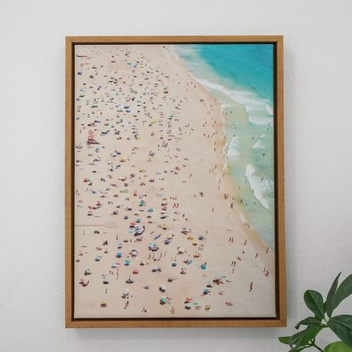 Unwind in a bright and airy living space, adorned with contemporary art pieces that add character to the room.