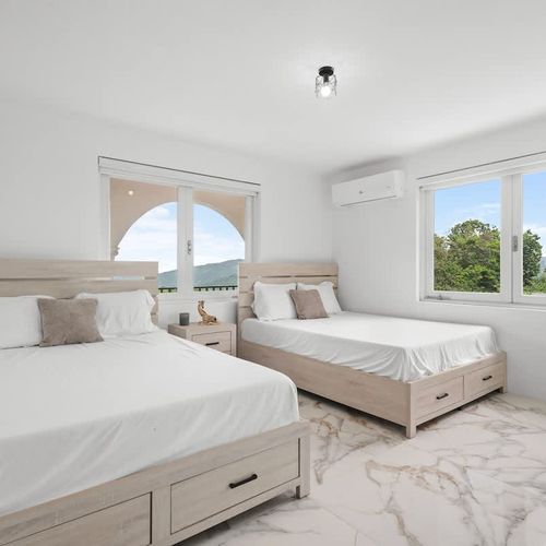 A serene bedroom with a calming neutral color palette.