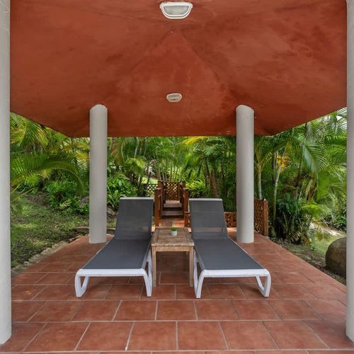 Enjoy the beauty of nature from this poolside oasis.