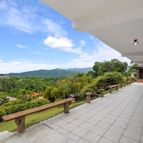 peaceful terrace with landscape views and benches