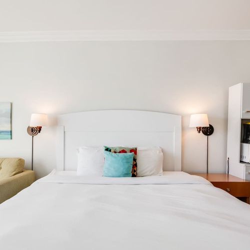 Enjoy seamless indoor-outdoor living with private balcony access, providing an exclusive vantage point to the vibrant surroundings.