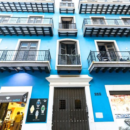 Welcome to a piece of history. This stunning building, showcasing classic Spanish colonial design and elegant wrought iron work, provides a picturesque backdrop for your unforgettable visit.