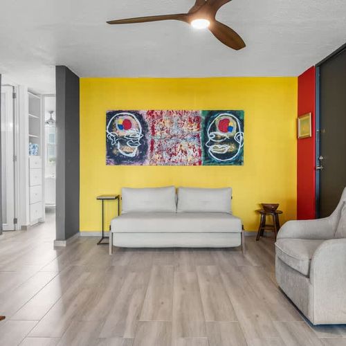 Our chic and cozy living space offers a comfortable sofa and smart TV, perfect for relaxing and unwinding after a day of adventures.