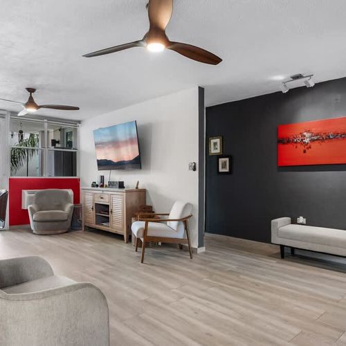 Spacious and stylish living room with ample seating and smart TV. Relax in comfort after your adventures.