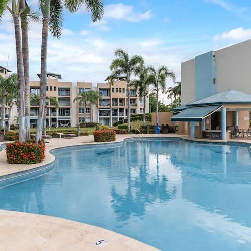 Dive into our stunning pool amidst a tropical oasis. Perfect for ultimate relaxation and sun-drenched days