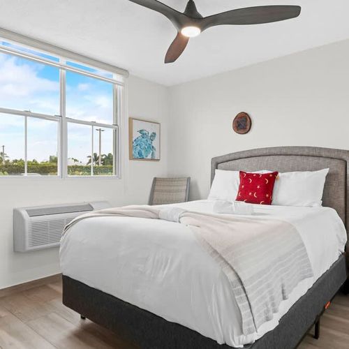 Unwind in our serene master bedroom with a plush king-sized bed. Your private sanctuary for restful nights.