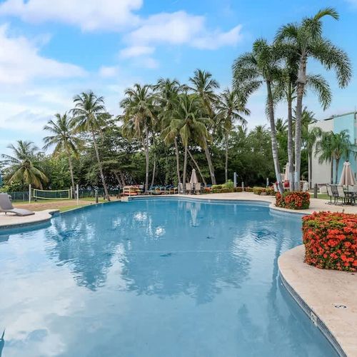 Experience resort-style bliss by our stunning pool area. Surrounded by lush landscaping for ultimate relaxation.