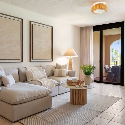 Relax in style! Our spacious living area with plush sofa offers comfort.