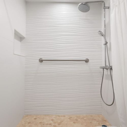 Enjoy a refreshing shower in this clean and well-maintained space.