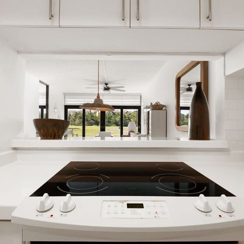 Cook your favorite meals in this modern, fully equipped kitchen with ample space.