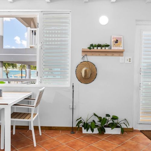 Breezy dining spot bathed in natural light.