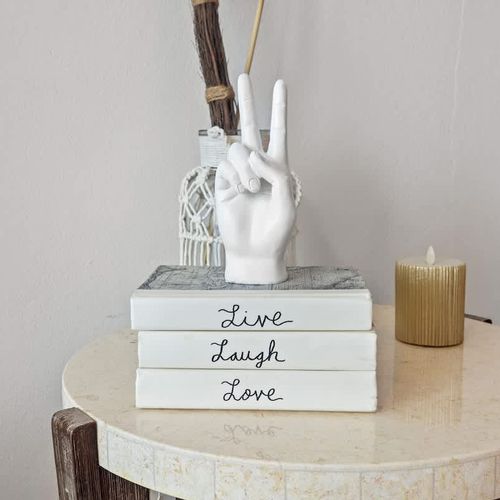 Find a peaceful escape to read a book in our comfortable and serene living room.