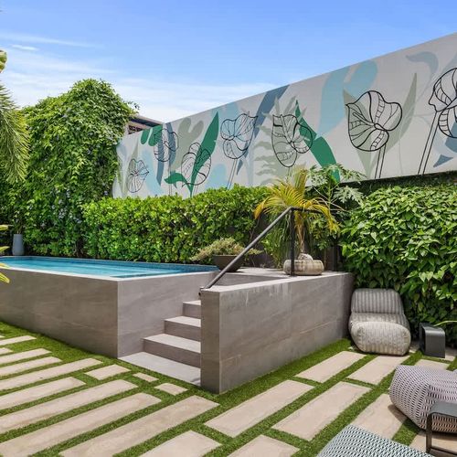 Enjoy poolside serenity with stunning views and a calming ambiance.