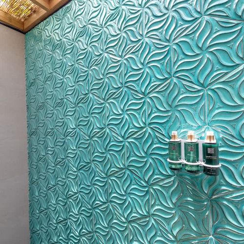 Modern simplicity meets comfort in this shower area.